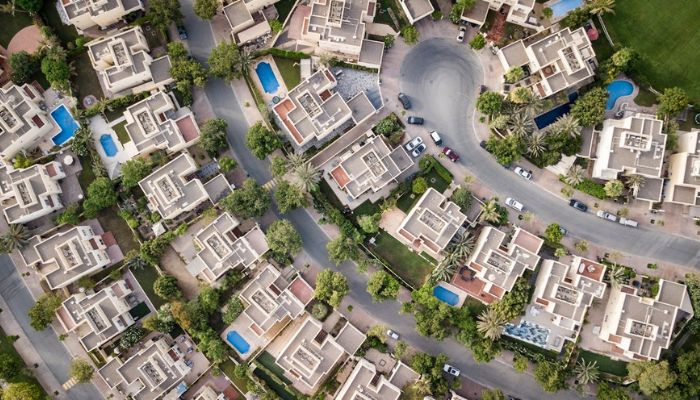 Developers lure buyers with middle-income housing as earnings shrink